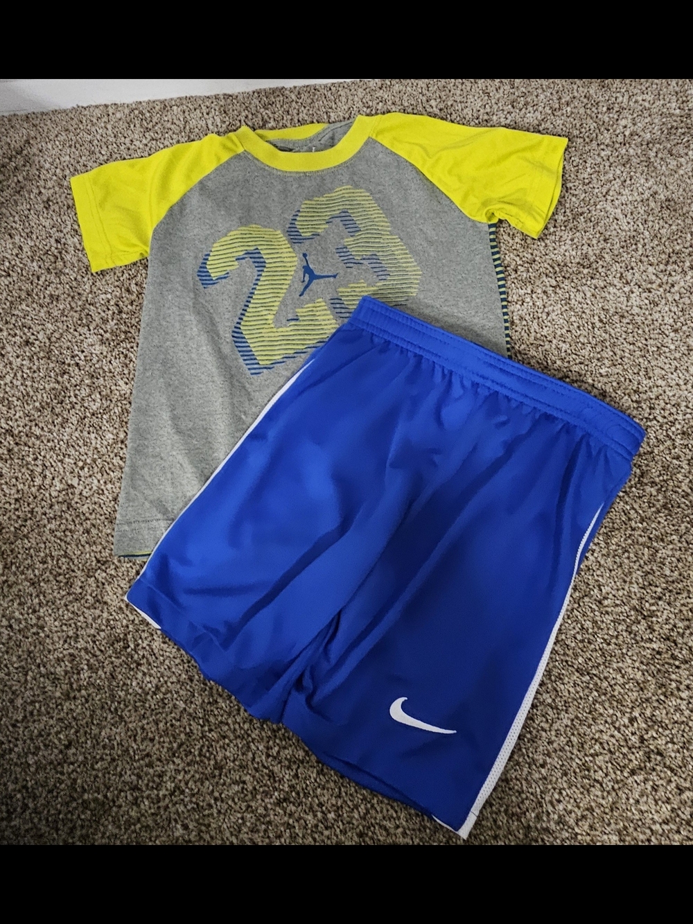 Jordan Gray Tee with Yellow Sleeves and Blue Nike Athletic Shorts